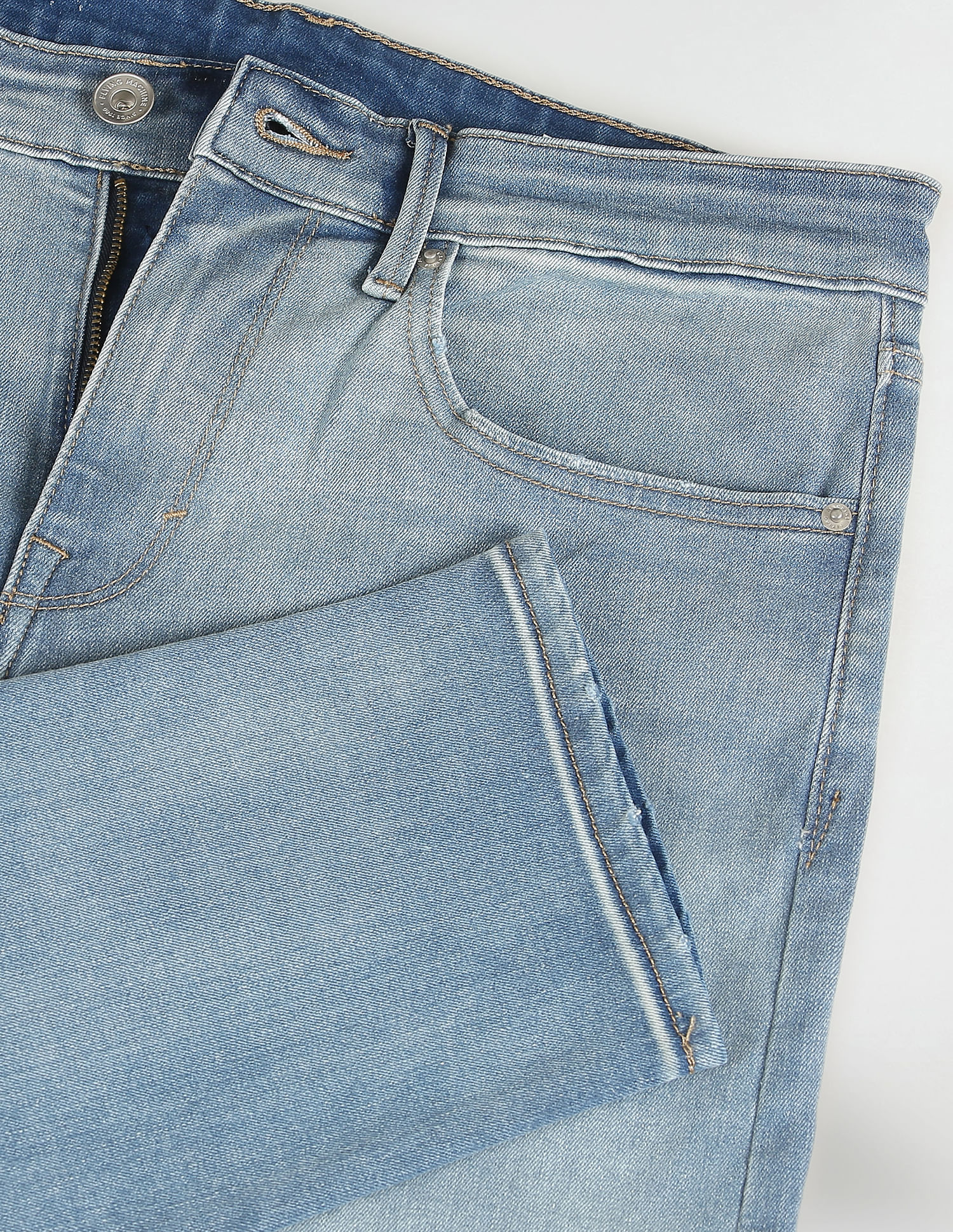 Flying Machine Slash Slim Tapered Fit Mid Rise Jeans