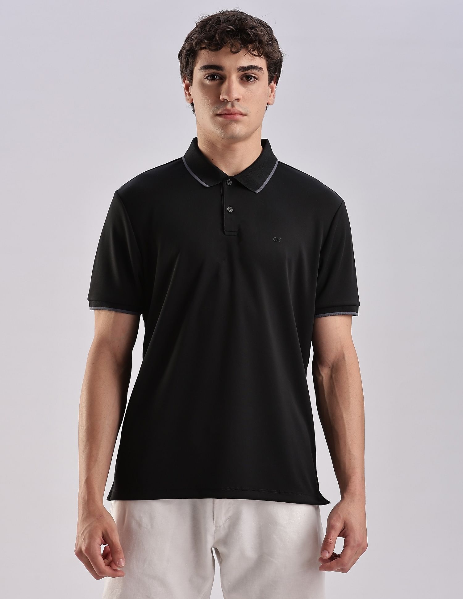 Calvin Klein Jeans Regular-Fit Solid Polyester Polo Shirt