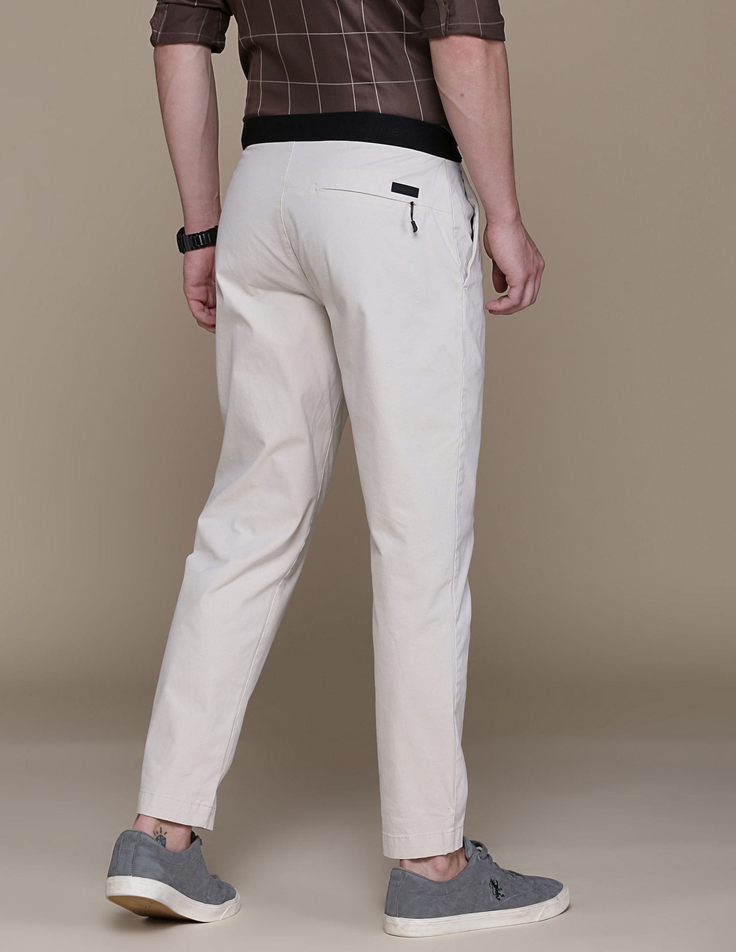 Calvin Klein Pants in jogger style in beige