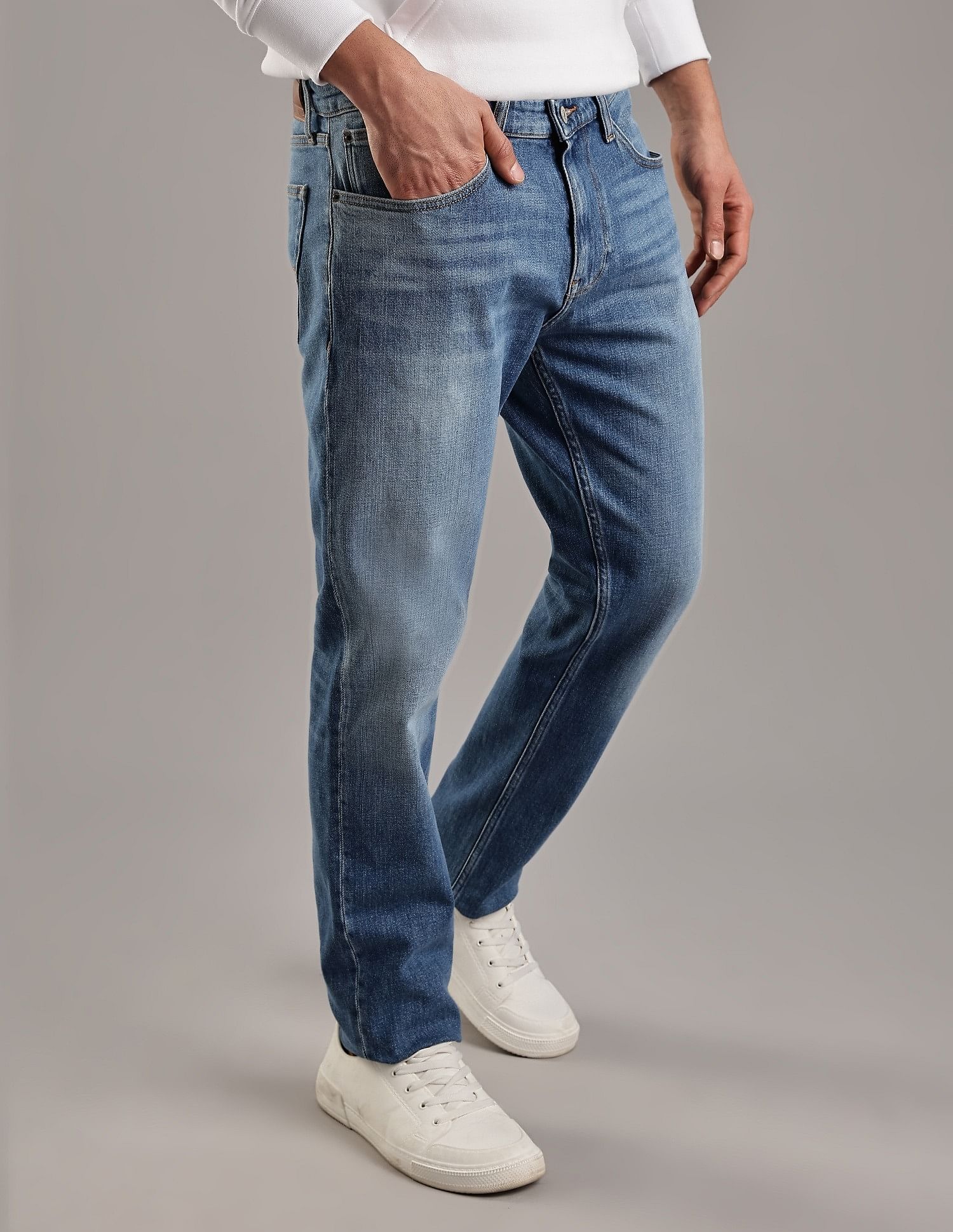 Tommy Hilfiger Mid-Wash Slim-Fit Mid Rise Jeans