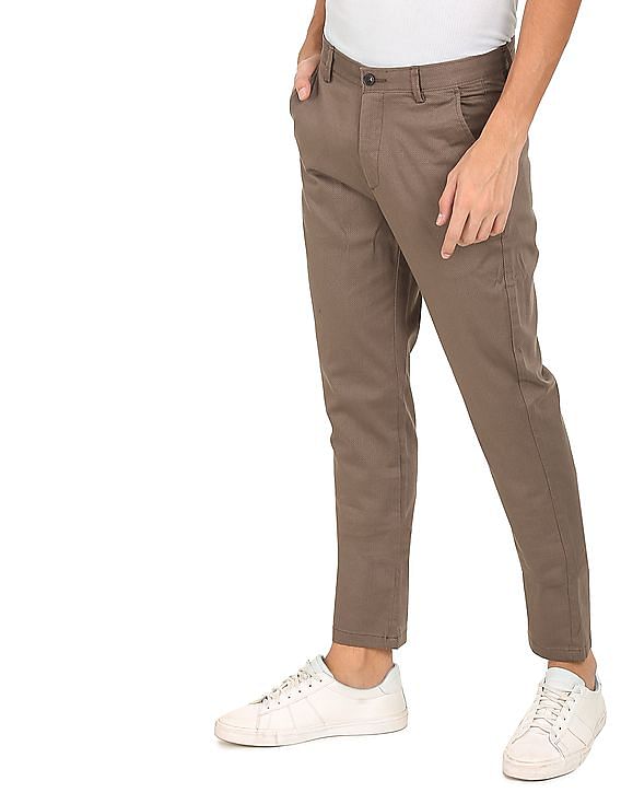 Buy Arrow Tapered Fit Solid Formal Trousers - NNNOW.com