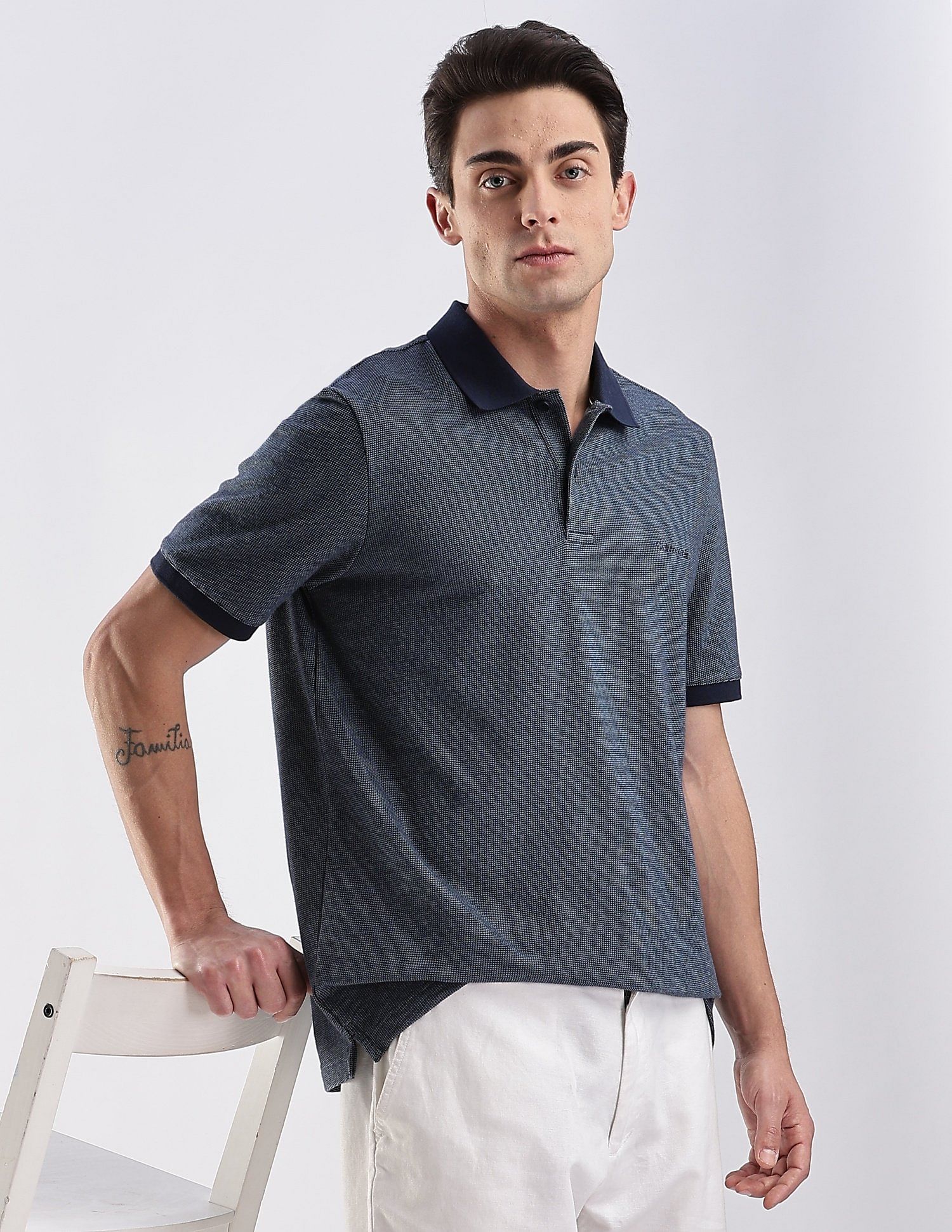 Calvin Klein Jeans Regular-Fit Heathered Cotton Polo Shirt