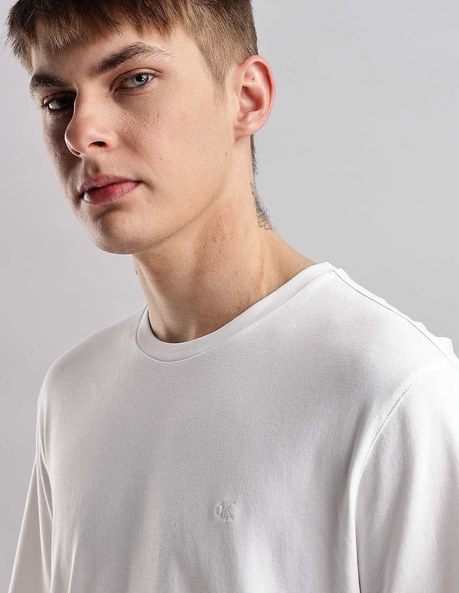 Calvin Klein Jeans Mens White Solid T-Shirts