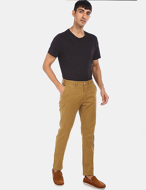 Buy . Polo Assn. These slim-fit chinos are a reliable addition to your  work-to-weekend collection and are designed with a mid-rise waist and a  classic five-pocket design. 