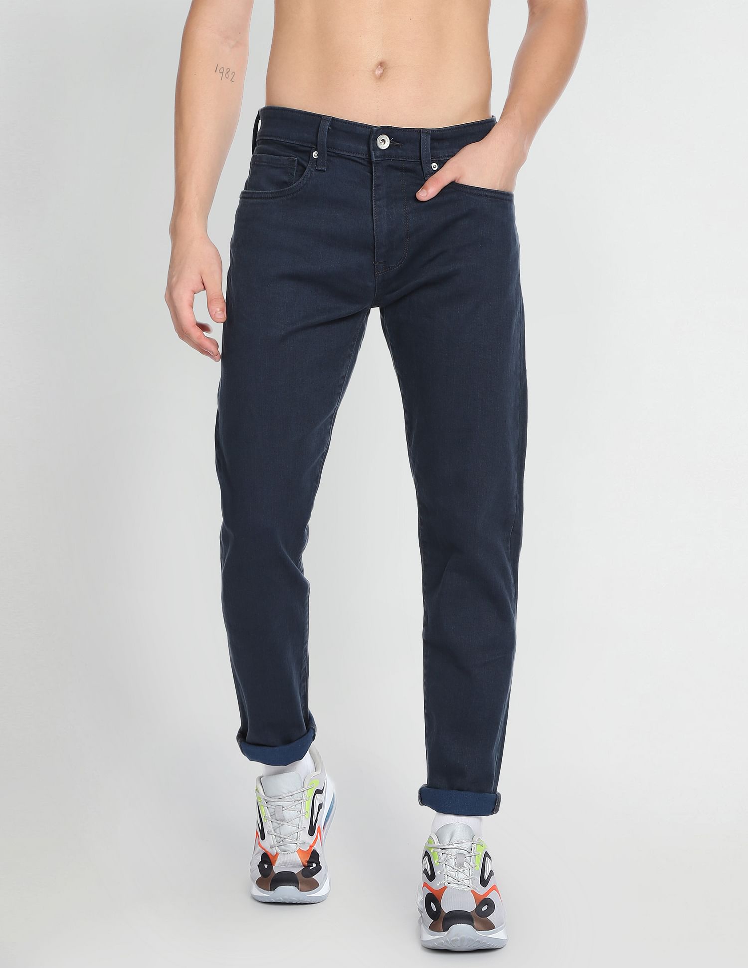 Flying Machine Slash Slim Tapered Fit Mid Rise Jeans
