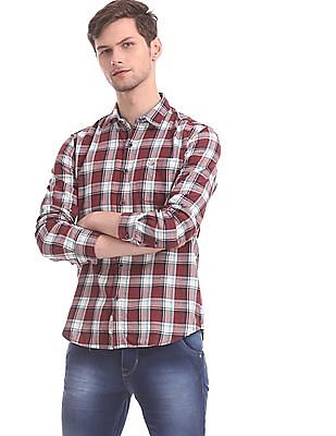 checked shirt and jeans