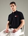 Tommy Hilfiger Solid Regular Fit Cotton Polo T-Shirt