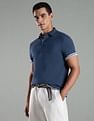 Tommy Hilfiger Solid Regular Fit Cotton Polo T-Shirt