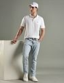 Tommy Hilfiger Heavy-Wash Slim Fit Mid Rise Jeans