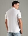 Tommy Hilfiger Solid Regular Fit Cotton Polo T-Shirt